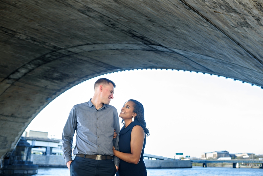 A bride to be holds on to her Fiance's arm in Philadelphia.
